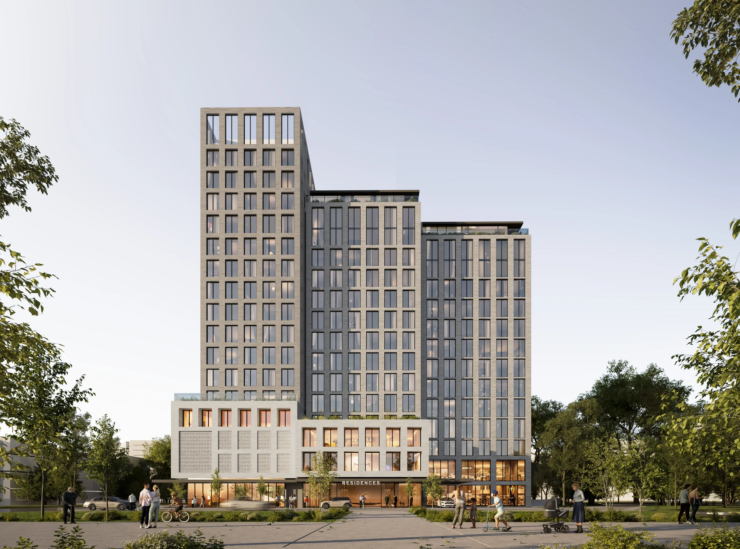 3·6 — Oakville: torres residenciales de ladrillo claro entre arbolado, Canadá