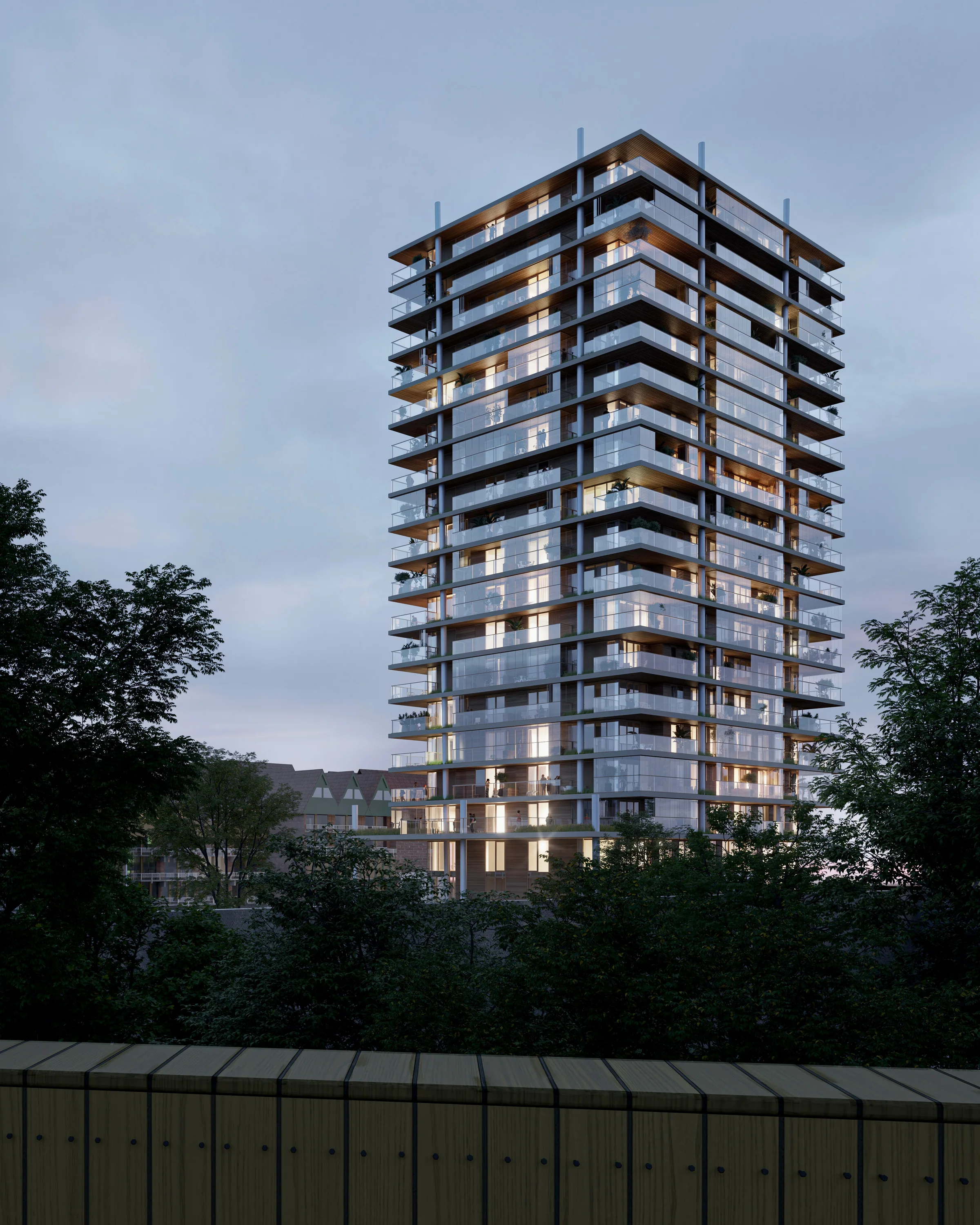 3·6 — Stroveer Tower: torre residencial iluminada al anochecer sobre los árboles, Róterdam